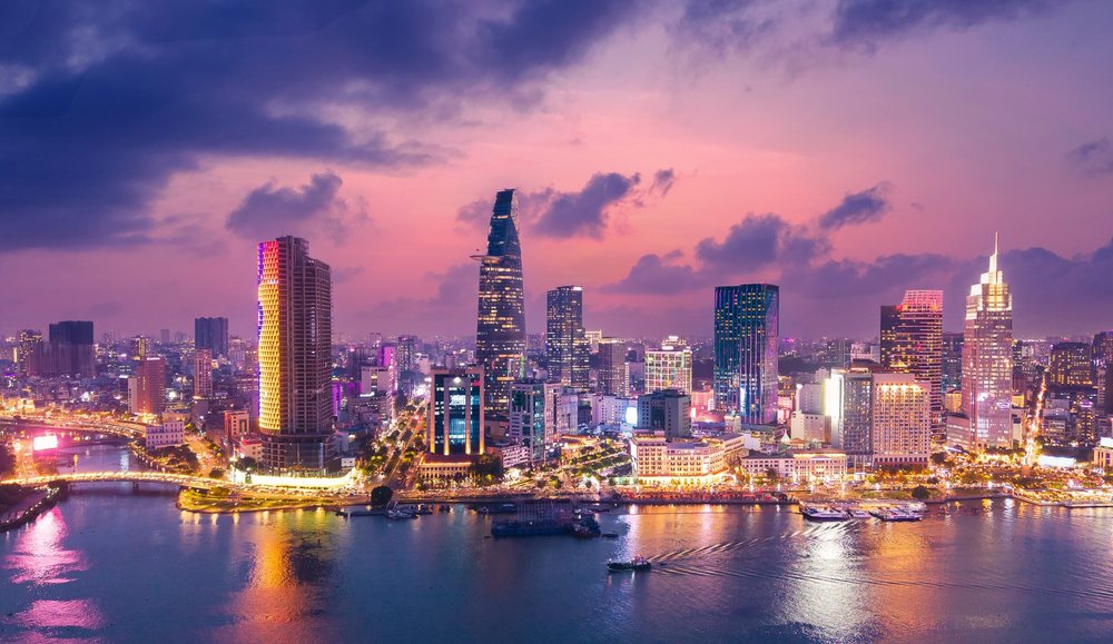 Ho Chi Minh City skyline at dusk above the Saigon River